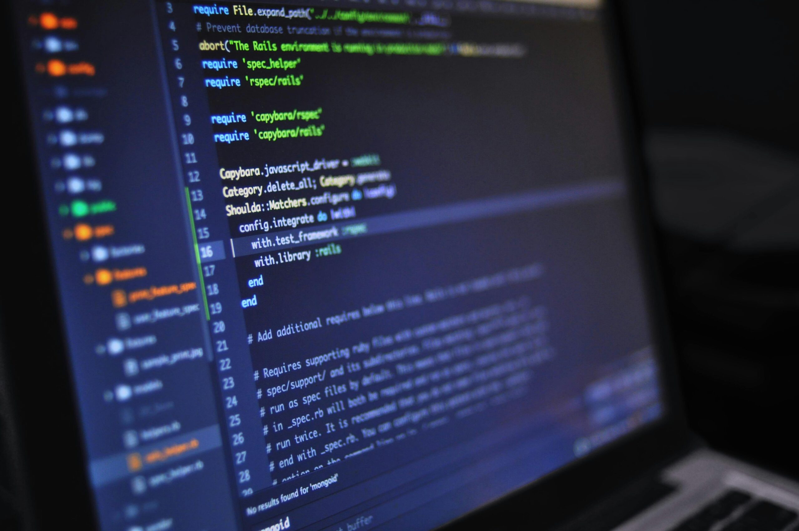 Close-up of a laptop screen displaying code, highlighting the technical proficiency of nearshore software development companies.