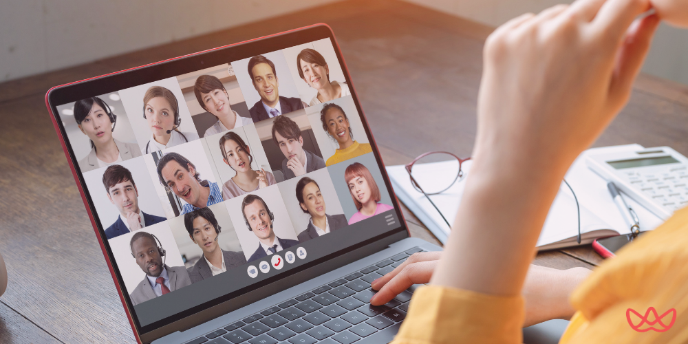 A video conference screen displaying diverse team members, showcasing collaboration and innovation in examples of outsourcing companies.