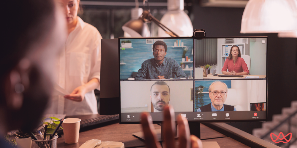 A virtual meeting showcasing a team discussing strategies, highlighting the efficiency of outsourced sales & marketing solutions.
