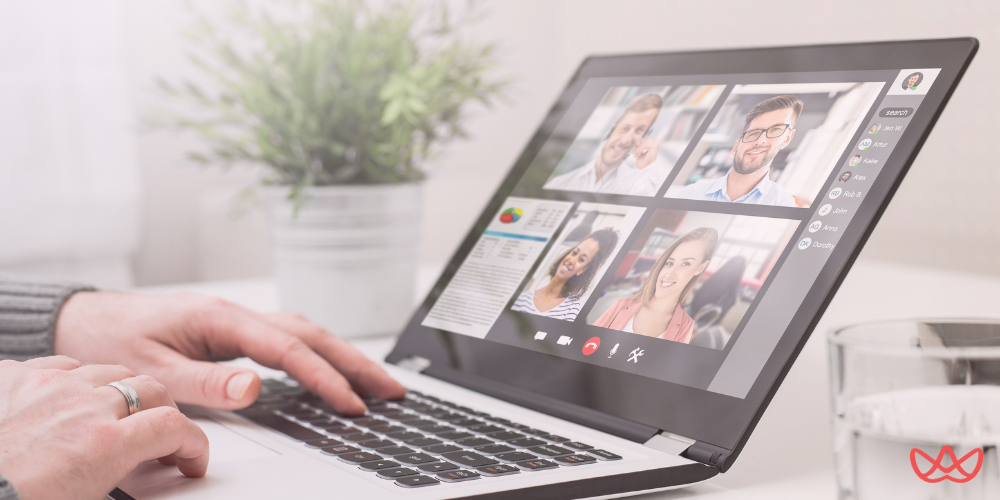 A professional video conference with diverse team members discussing outsourcing staff strategies.
