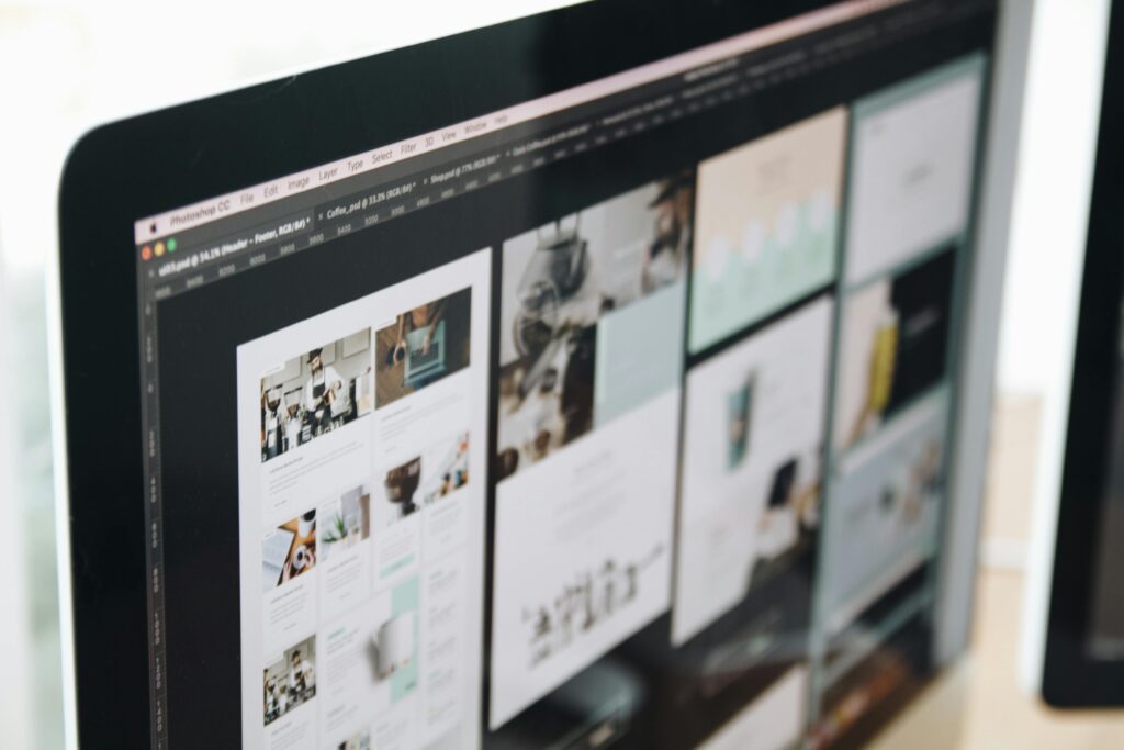 UX UI designer crafting multiple design layouts and prototypes in Adobe Photoshop CC.