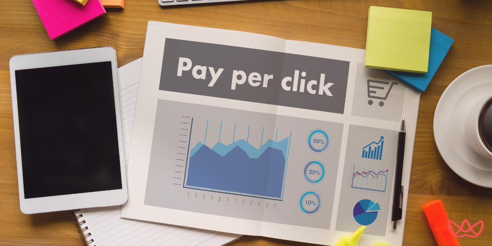 Amazon PPC Manager Resume Template displayed on a desk alongside a tablet, sticky notes, a coffee cup, and a pen.