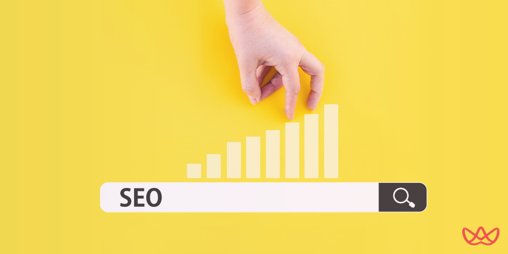Hand reaching toward growing bar chart above SEO search bar, illustrating how to outsource multilingual SEO strategies for global market expansion and international business growth.